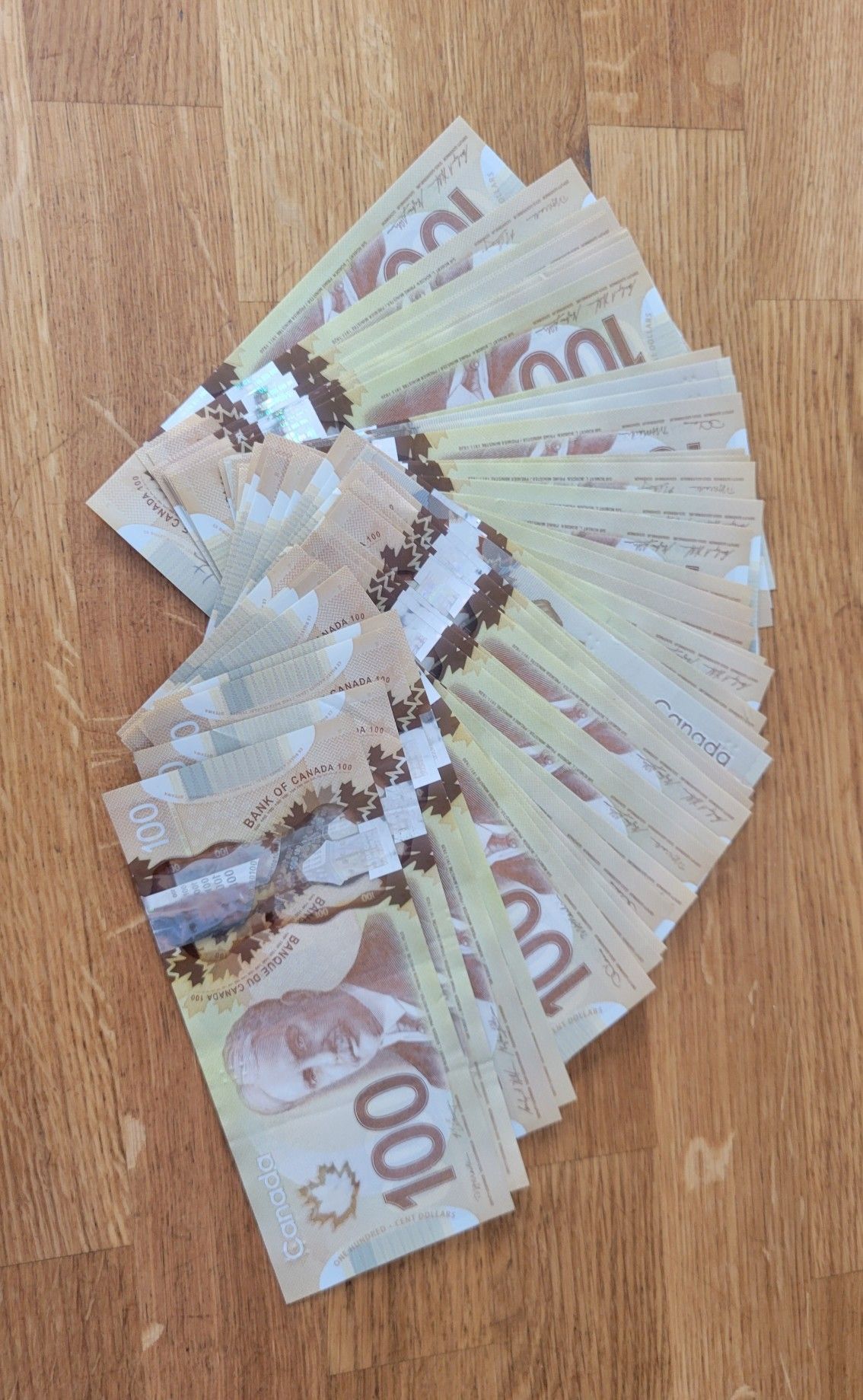 Buy CAD $100 Prob Money